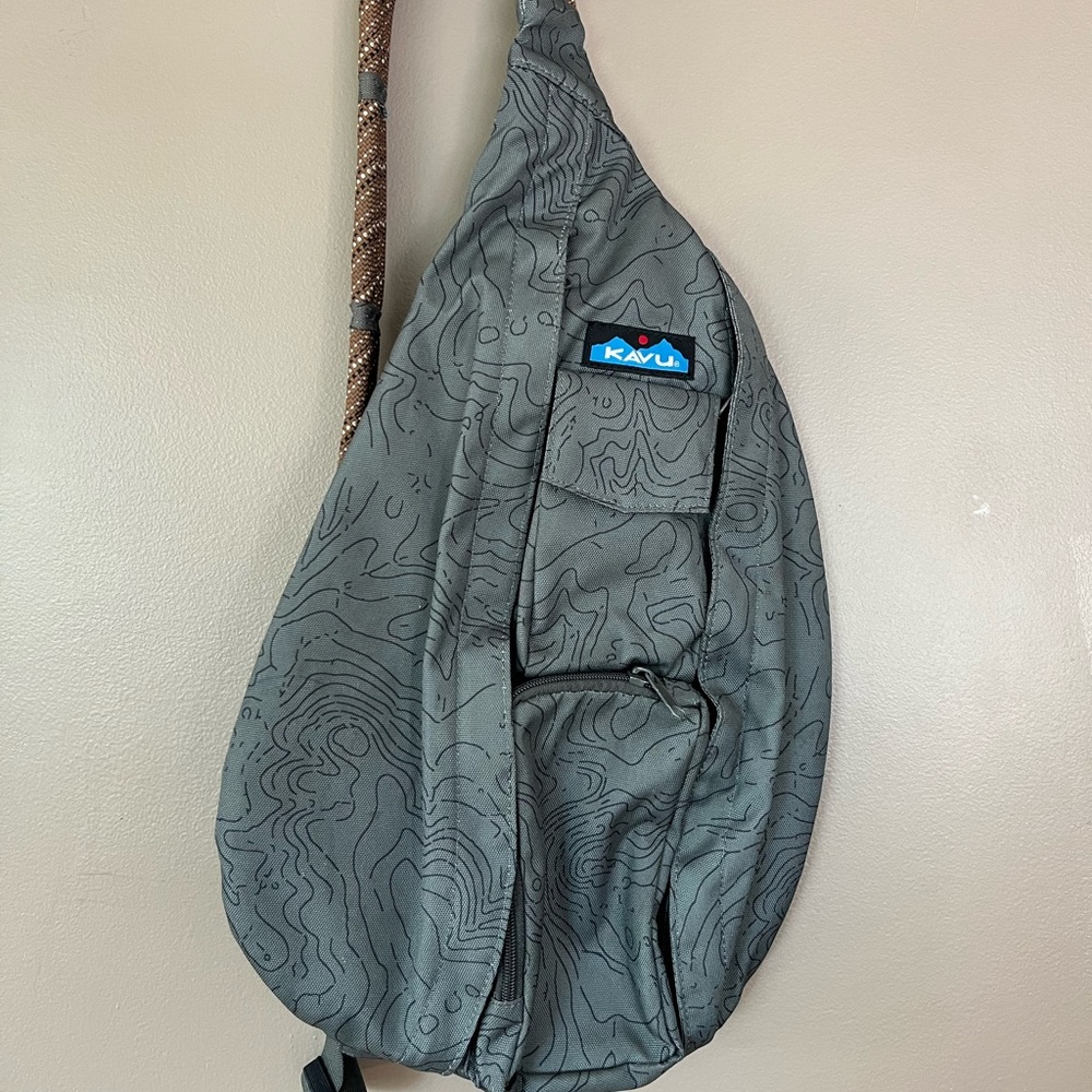 Kavu original rope sling bag in forest green topographical pattern
